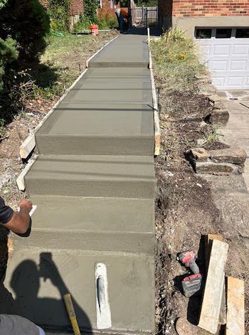 Concrete steps and walkway installation