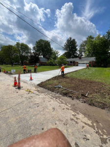 This photo shows a concrete driveway